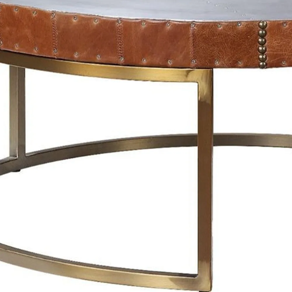 36 Brown And Silver Leather And Metal Round Coffee Table