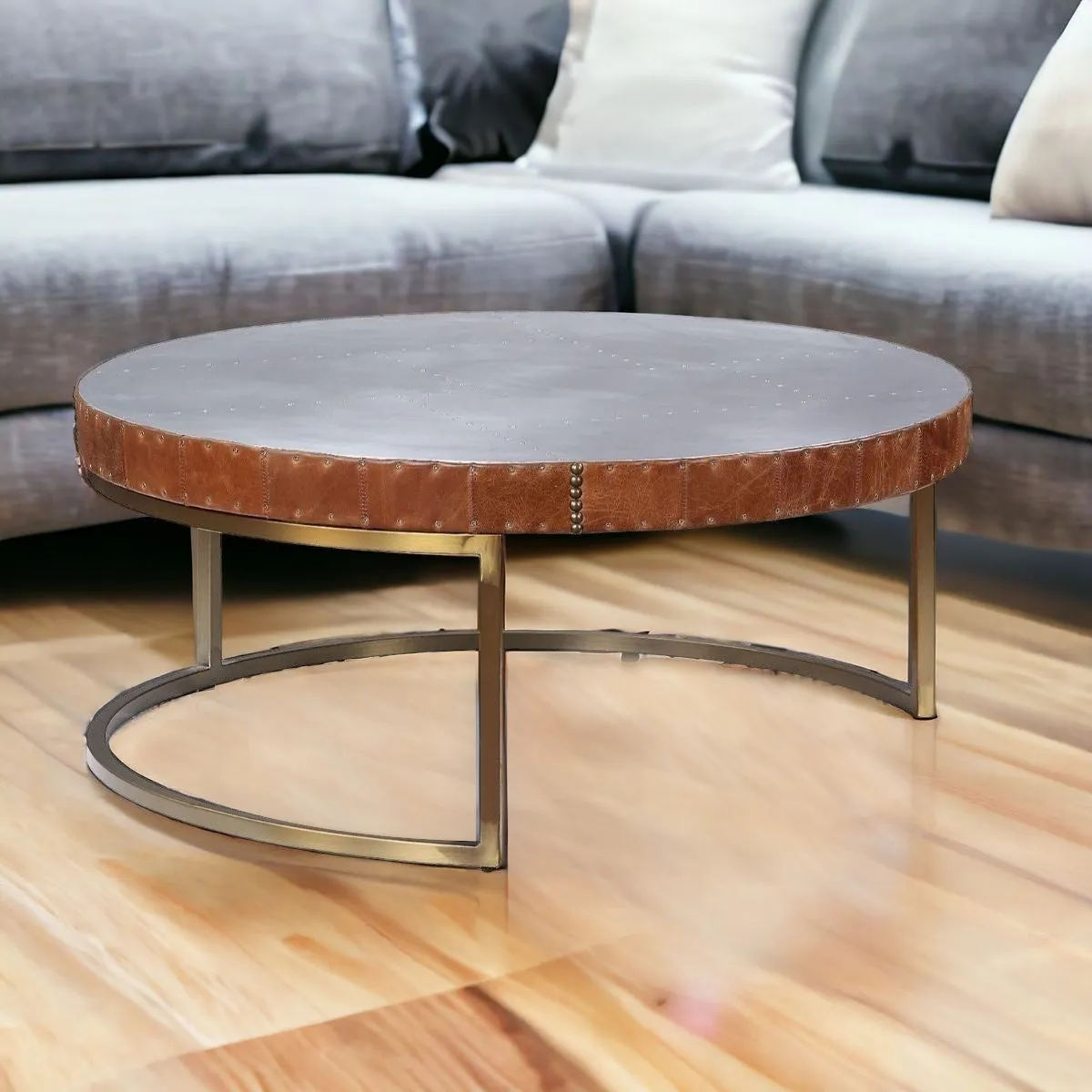 36 Brown And Silver Leather And Metal Round Coffee Table