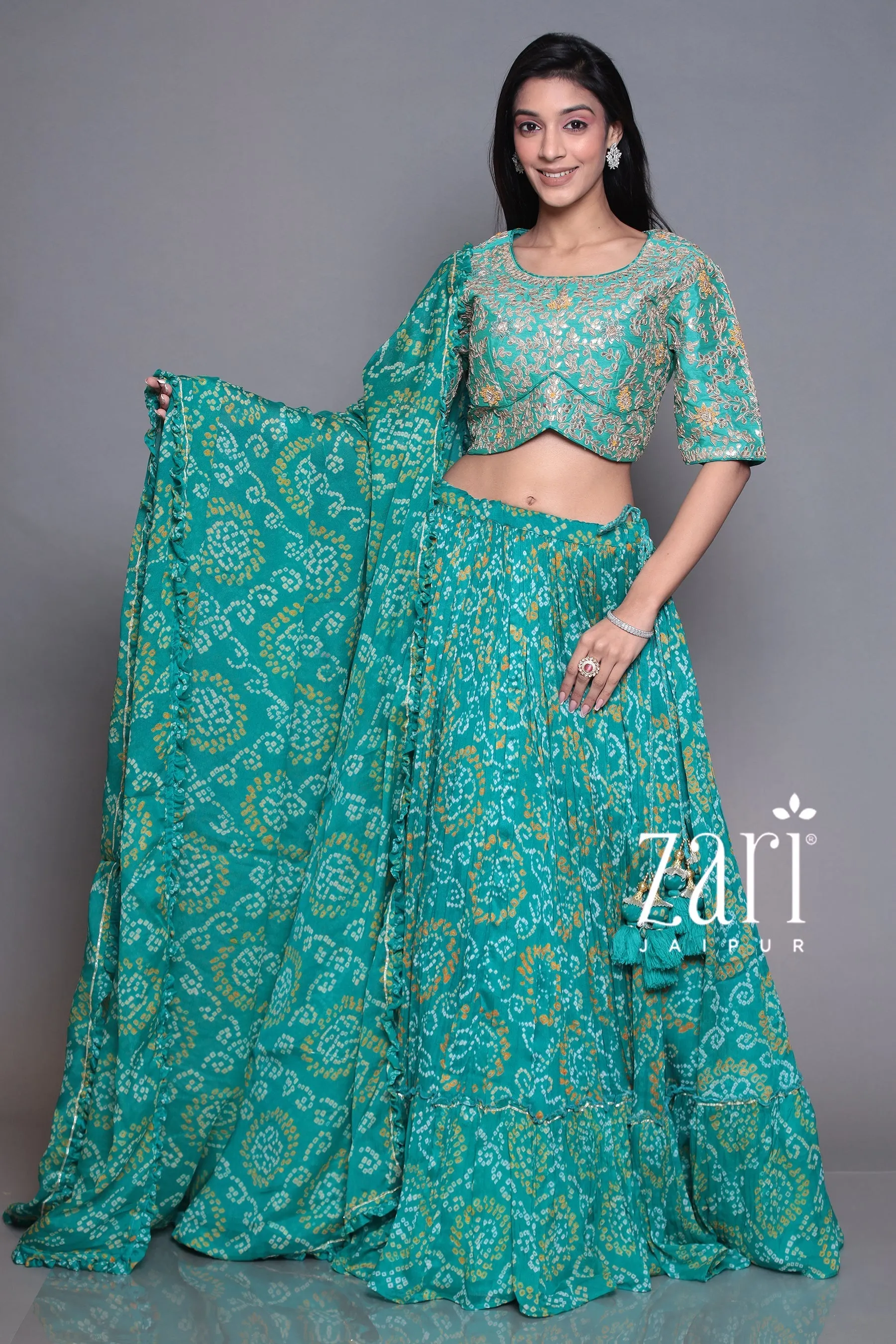 Bandhej Chinon silk  Lehenga with Aari, Gota Patti, Sequins, Thread, Zardozi work.