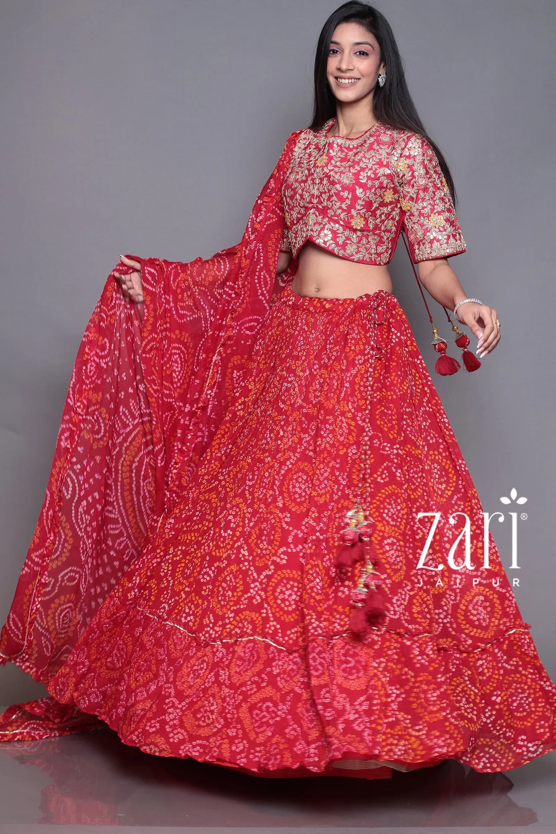 Bandhej Chinon silk  Lehenga with Aari, Gota Patti, Sequins, Thread, Zardozi work.