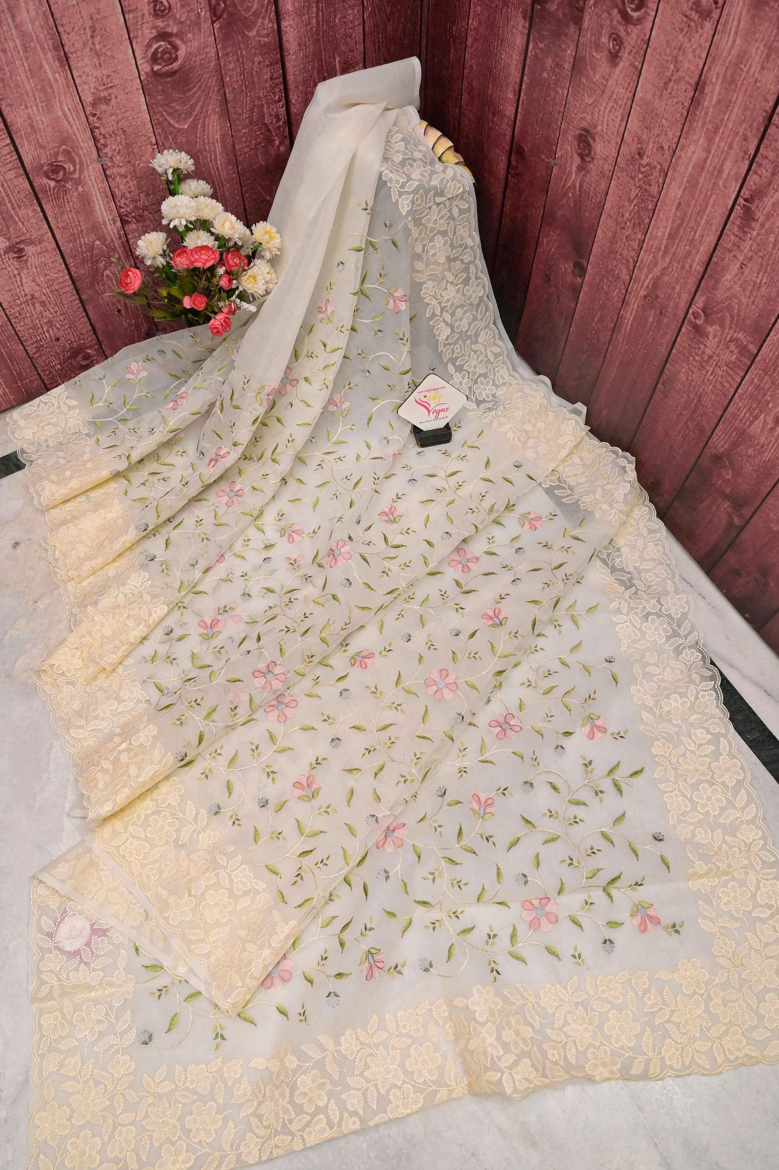 Light Cream Color Organza Saree with Machine Embroidery